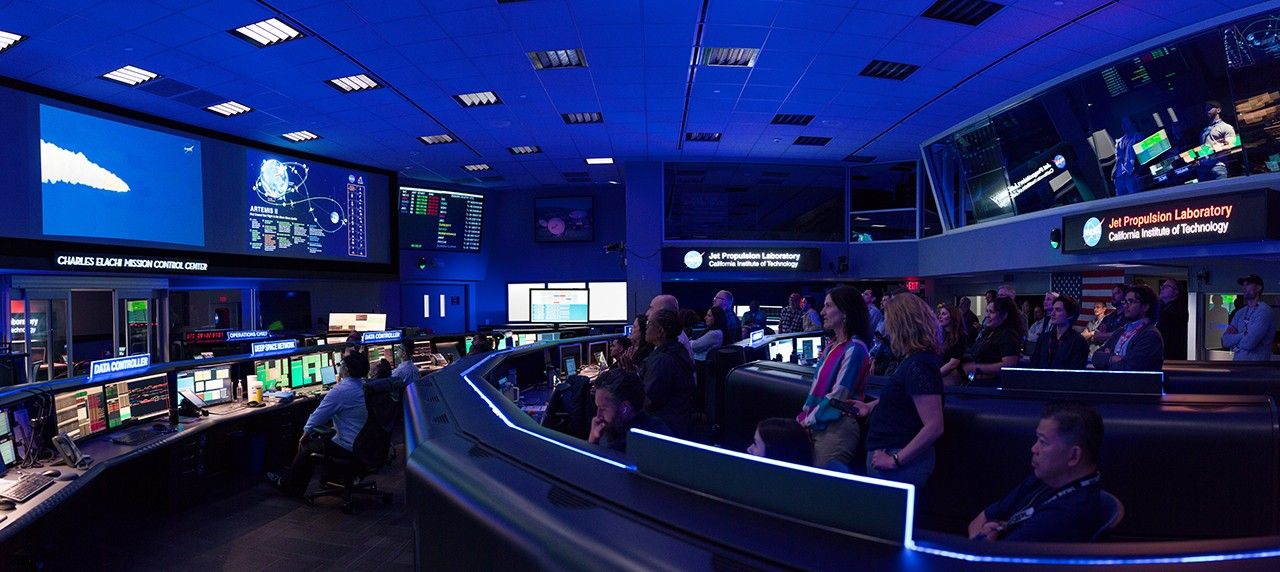 Staff at NASA’s Jet Propulsion Laboratory in Southern California watch the launch of the agency’s Artemis II mission to the Moon on April 1, 2026, at the Space Flight Operations Facility, which operates the Deep Space Network (DSN).